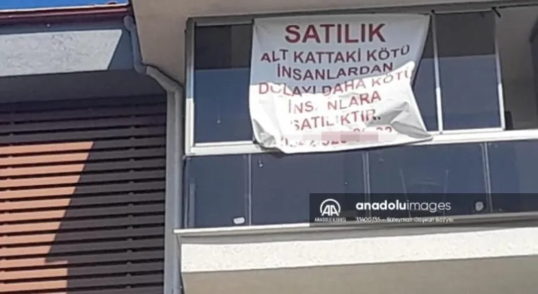 Üst kat komşusunun astığı satılık ilanını, mahkeme kararıyla kaldırttı